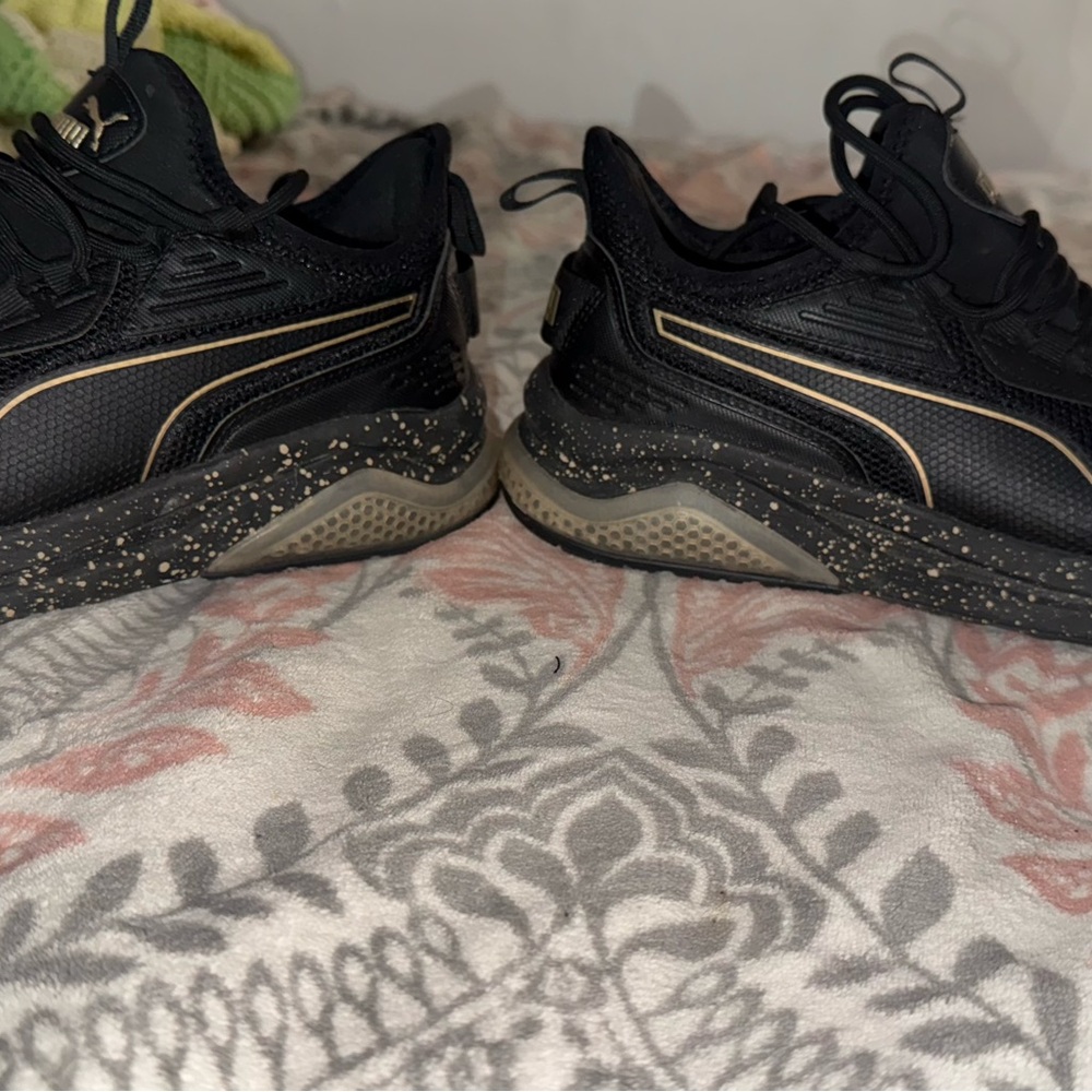 Puma 7.5 Black Sneakers with Gold Accents